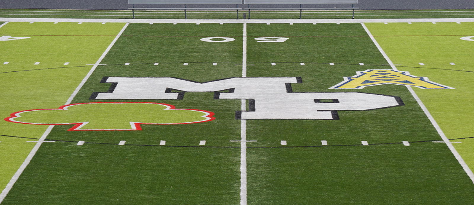 Midfield at Community Memorial Stadium, showing the natural grass field as it looks today